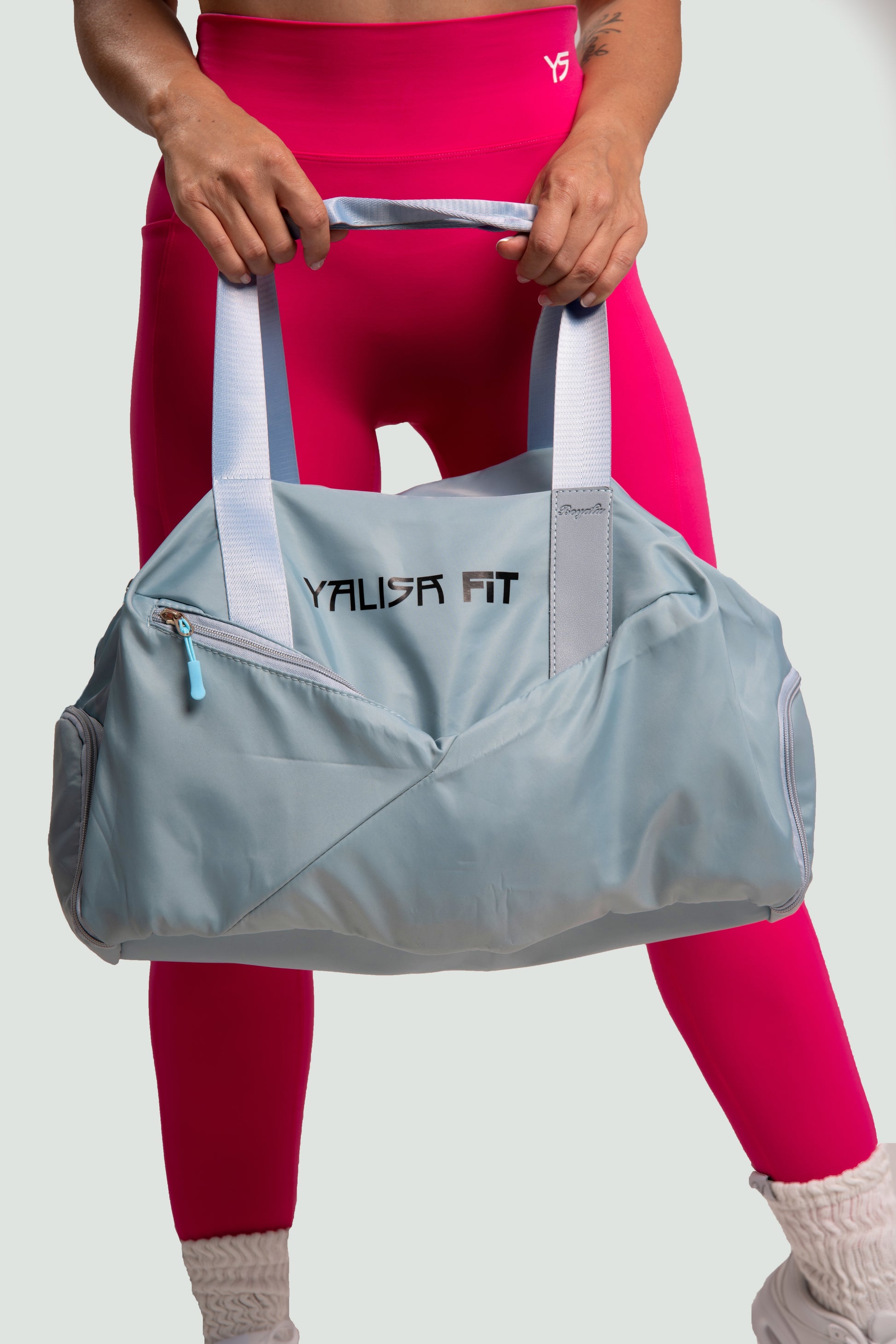 Bolsa de mano deportiva de color azul